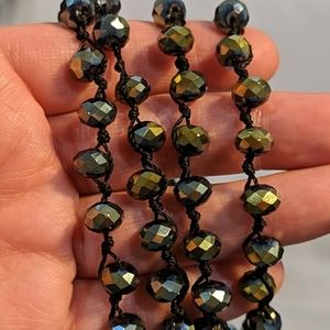 Long iridescent greenish blueish beaded necklace